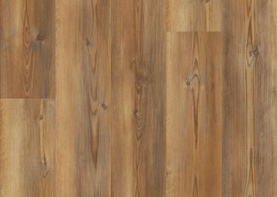Wooden floor with a natural grain pattern and warm brown tones, featuring staggered rectangular planks—expertly installed by Eastman's Carpets Inc flooring services.